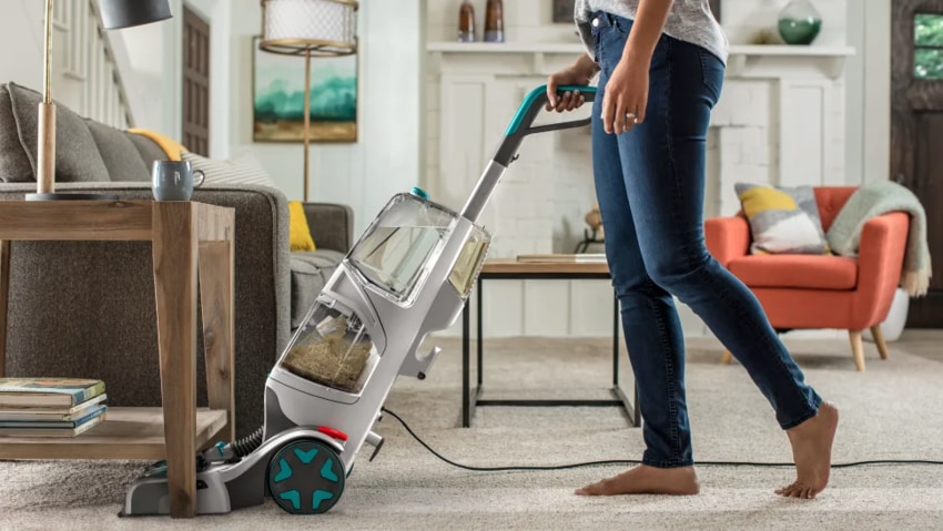 Woman Vacuuming Home